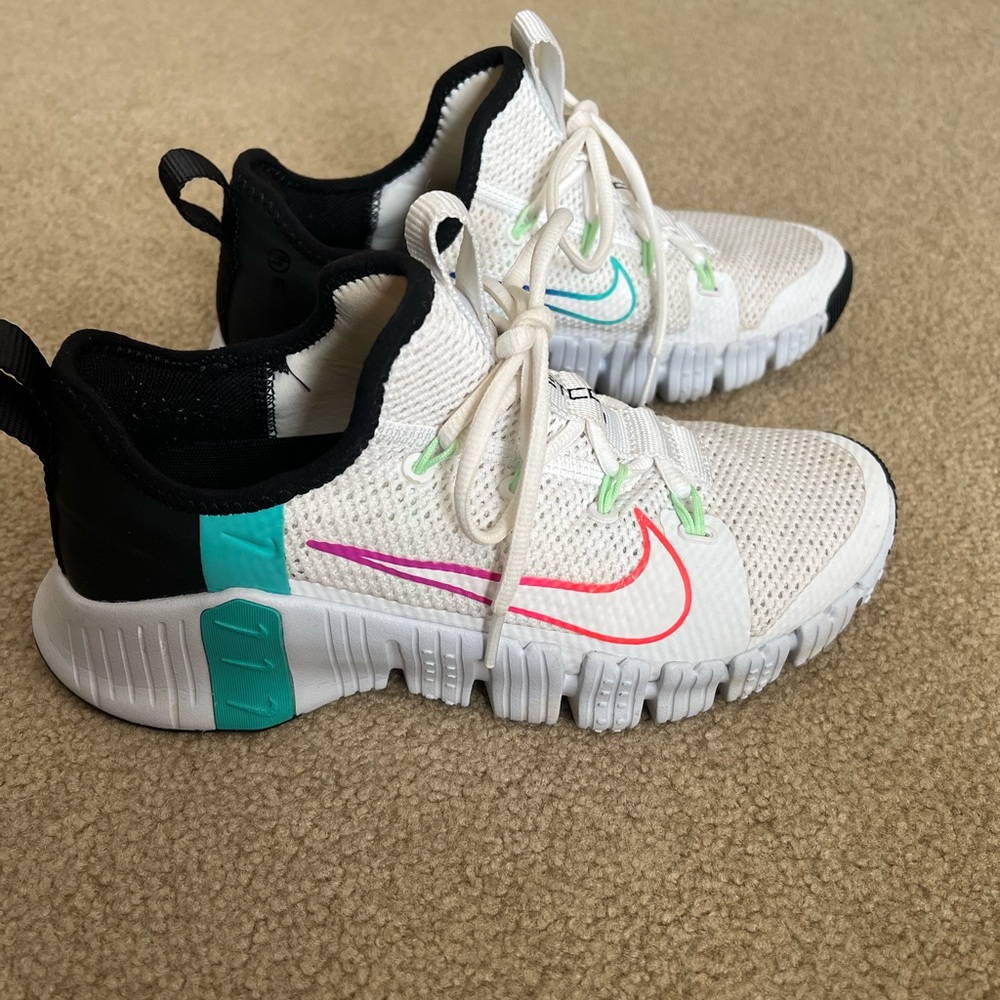 Nike White and Pink Athletic Shoes Modern Design